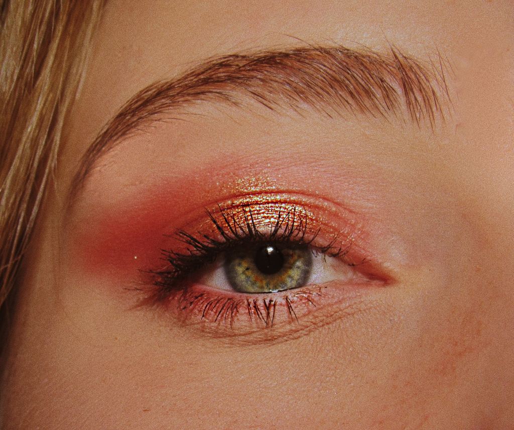 photo of the eye of a woman who is wearing eye makeup